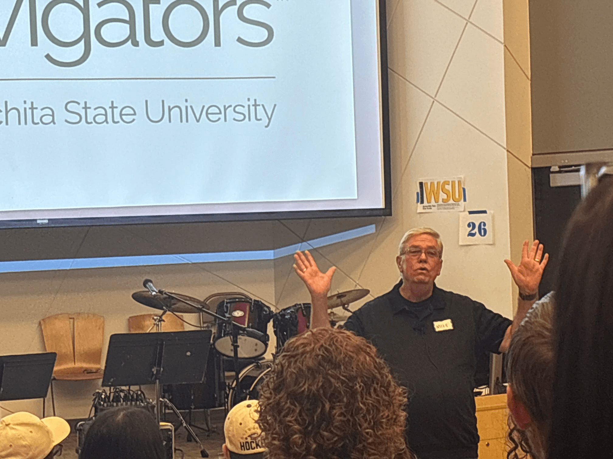 Speaker presenting to students at a gathering