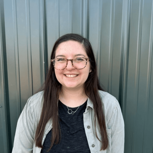 Ally Madrigal smiling indoors