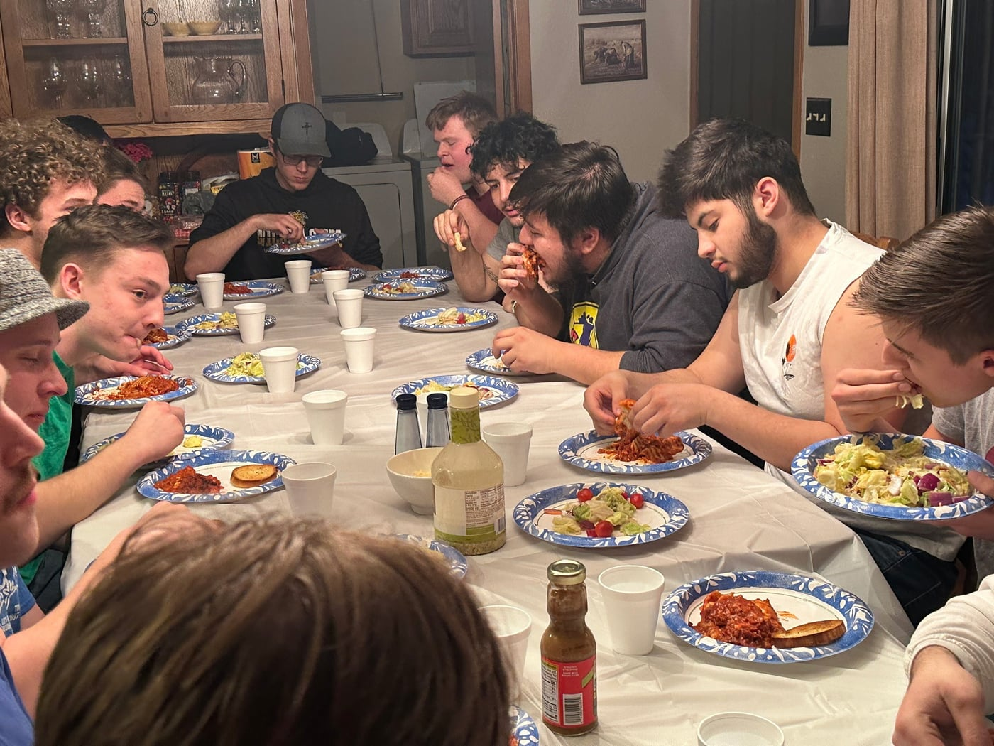 Noblemen gathered around a table for a shared meal